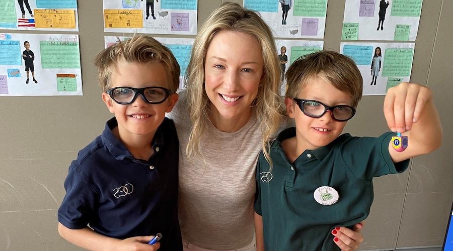 Patient Jasmin Felton is the first at 十大靠谱彩票平台 to undergo an awake spine surgery. She stands with her sons, Maximilian and Asher. (Courtesy of Jasmin Felton.)